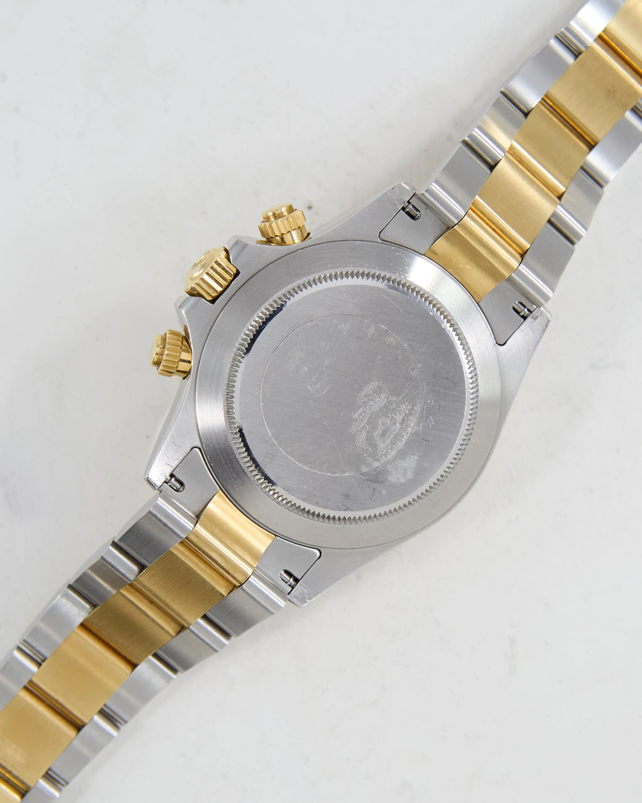 ROLEX DAYTONA BLACK DIAL IN STEEL & GOLD ON OYSTER BRACELET